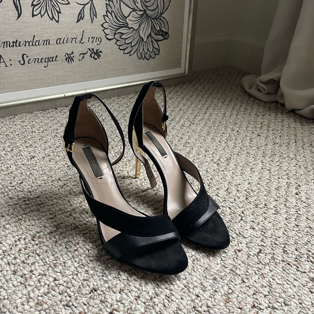 Black and gold heels